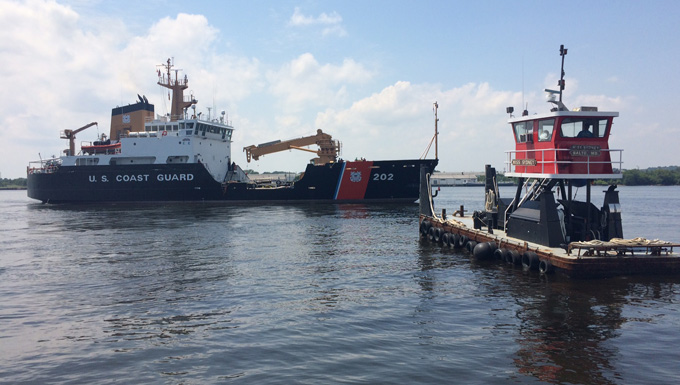 Coast Guard Cutter Willow sails away from the Coast Guard Yard in Curtis Bay, Maryland.