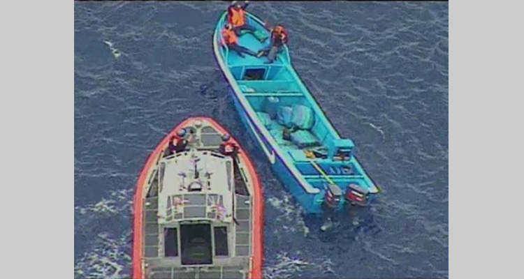 Coast Guard Cutter Stratton’s long-range interceptor-II cutter boat approaches a suspected drug smuggling vessel