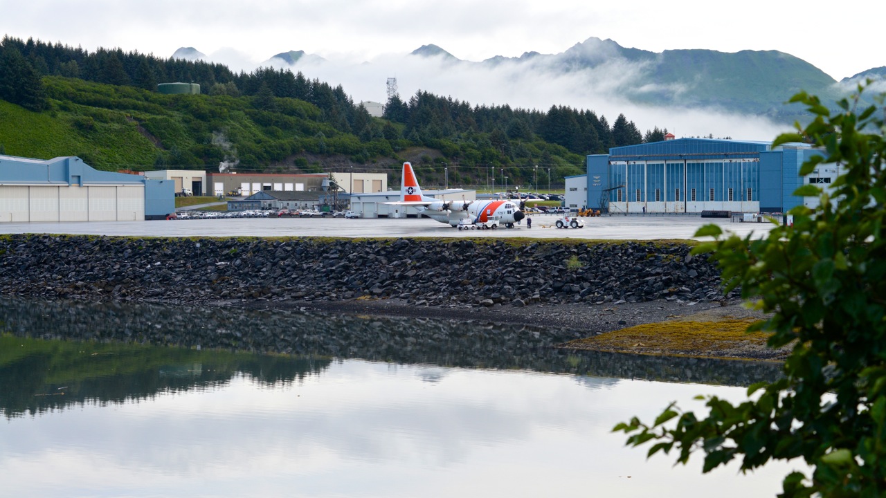 An HC-130 departs for patrol by PA1 Sara Mooers.