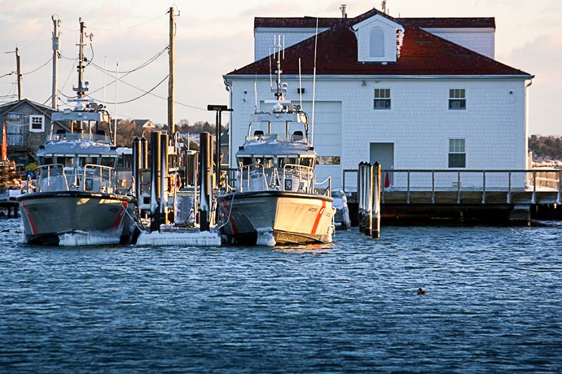 Two 47-foot response boats are docked in front of the new Coast Guard Station Menemsha boat house on Martha’s Vineyard in Chilmark, Mass., March 31, 2015. The boat house replaces the previous boathouse that was destroyed in a fire in 2010. (U.S. Coast Guard Photo by Petty Officer 2nd Class Rob Verdone)
