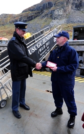 Photo of Coast Guardsman shaking hands
