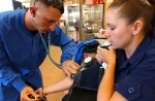 patient having their Blood Pressure taken