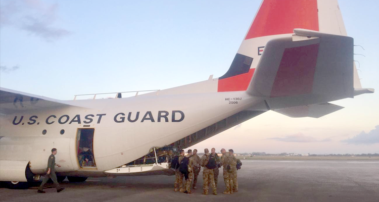 Coast Guard Air Station Miami aircrews load relief supplies for Puerto Rico